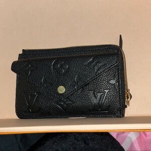 Louis Vuitton Black Clutch with Gold Accent